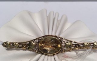 A gold necklace centerpiece