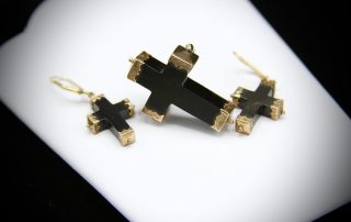 Black crosses with gold trim