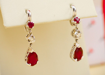 Two ruby and gold earrings