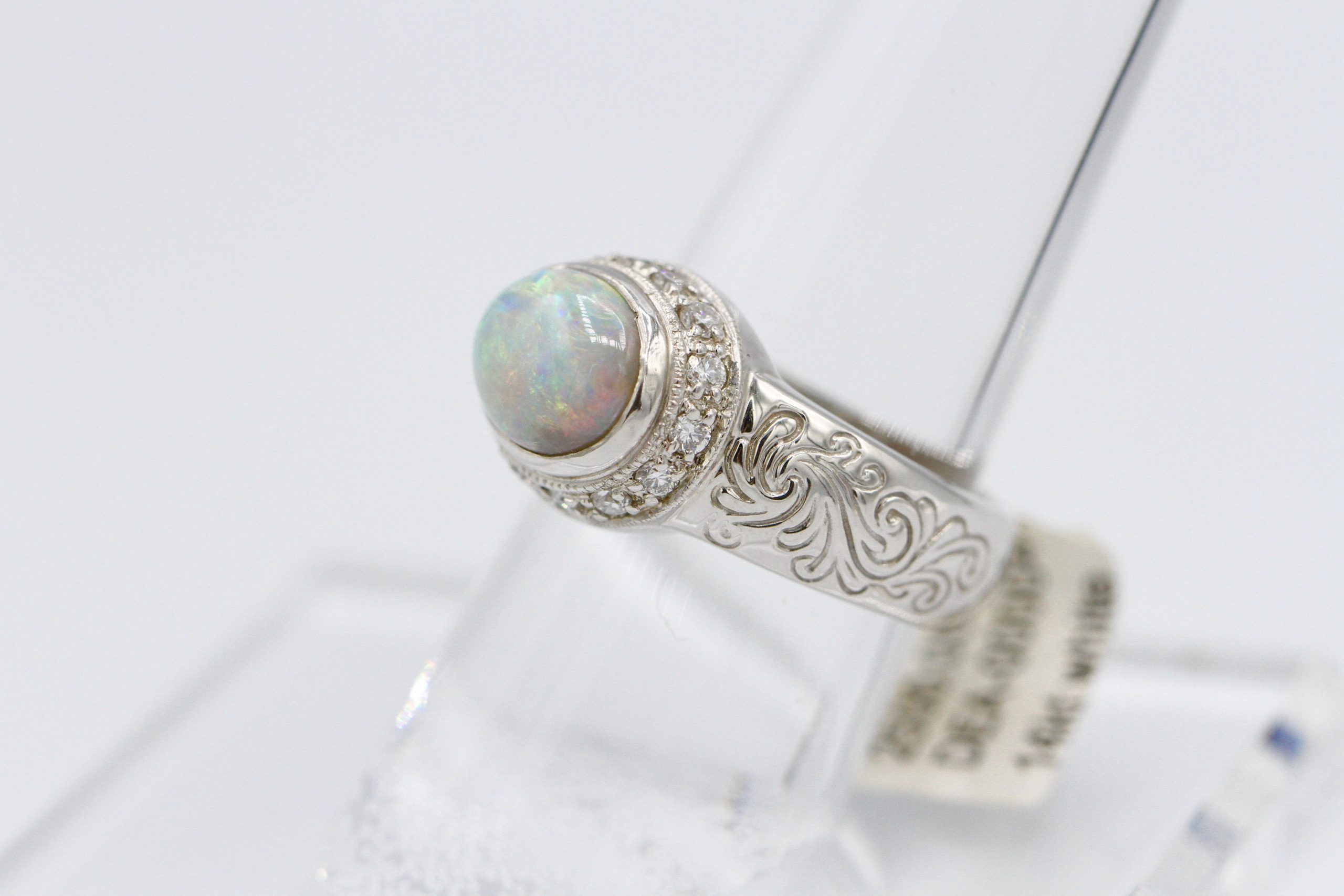 A ring with a large, multi-color gemstone