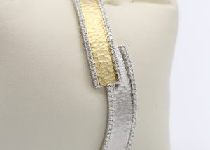 A gold and silver bracelet