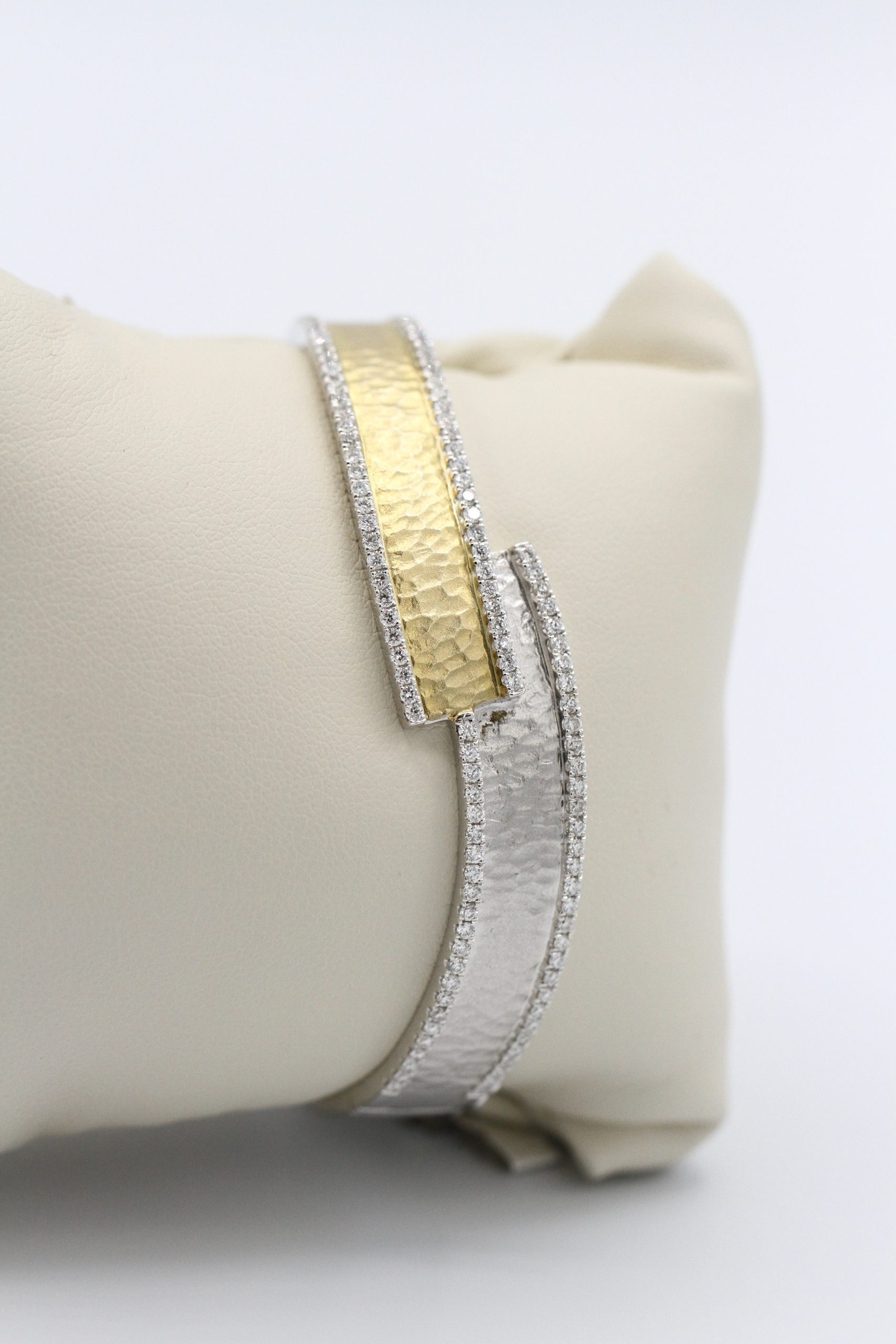 A gold and silver bracelet