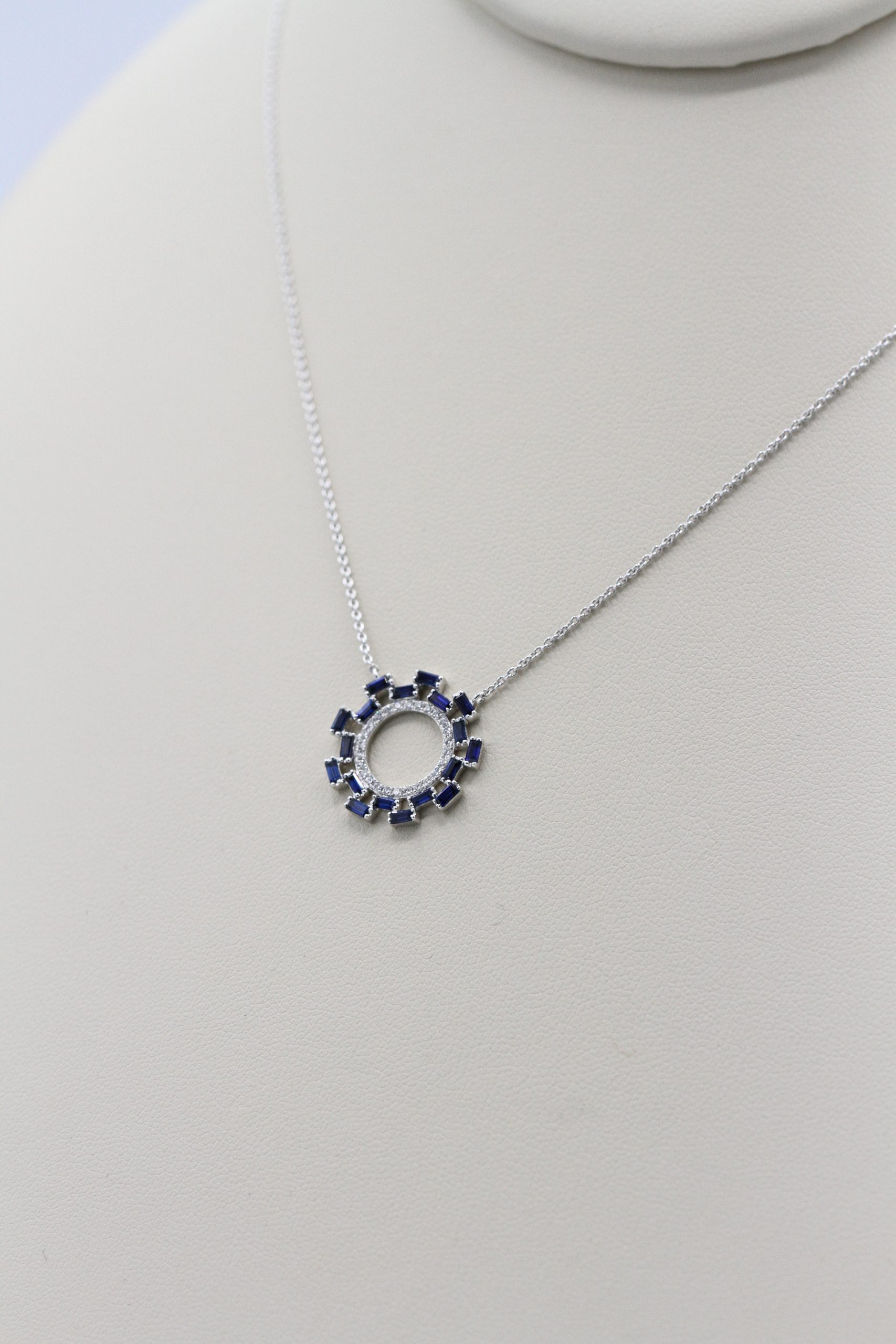 A necklace with a circle-shaped centerpiece.