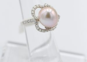 A ring with a pearl centerpiece